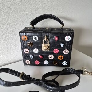 Black Croc-Embossed Handbag with Colorful Accents